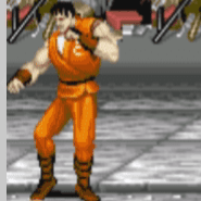 Shows man in like orange martial arts jump suit on with big muscles showing on his arms and orange coloured clothing with black hair and shows him on like street area