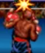 Shows George Forman punching guy in front of him with star like effect to represent his head in blue boxing ring